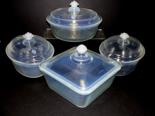 Collection Of Vintage Fry Opalescent Glass: including square lidded baker casserole h. of base 3'' with lid 5'' 7'' x 7'' 5, one round casserole with berries on lid dia,6 1/2'' base 3'' deep, two oval casseroles one with berries on lid, both 3'