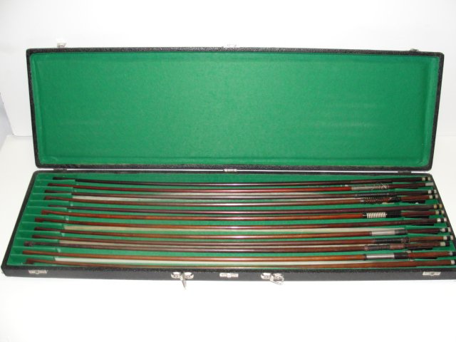 Twelve Bow Case With 12 Stamped Name Bows: Including, L. Bausch, Schindler, Durro Artist, G.A. Pfretzschner, Lufot, Bausch, Josef Richter, Bausch, Martin, Antonio lovers, Remenji, Tourte. Condition some needing rehairing with used case.