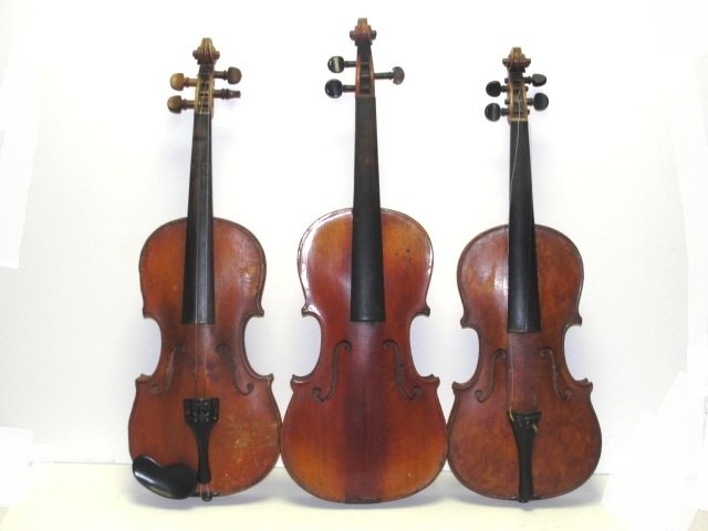 Three Stradivarius Model Labeled Violins: Two having normal Antonius Stradivarius paper labels. Condition overall fair to good bodies with two having tiger maple two piece backs, all needing some restoration and missing parts.'' SEE PHOTOS'' 