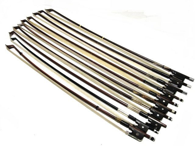 Group Of Ten Violin & Cello Bows 3 Stamped: Roth Glasser, Germany and Glasser. Condition used. Four 29 1/2'' Three 29'' ( missing silver tip) One 28'' Two 26 1/2''. Condition used.