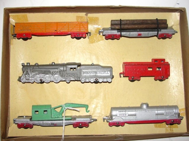Tootsie Toy # 5550 Never Used In Original Box: painted die cast metal - 6 piece set , engine, tender, 4 cars & caboose, appears never used with colorful box and insert box 11" x 8"