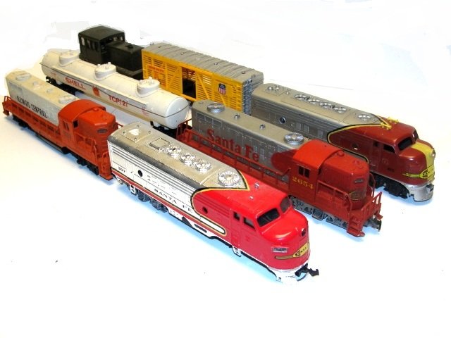 Group Lot Of Odd Train Engines & Cars: Condition used, one engine has wheel coming off and need wires hooked back up, all untested.