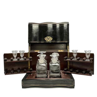 Antique - Napoleon III Boulle Style Tantalus Box Set: French Ebonized Tantalus case with brass inlays drink set with crystal decanters and four square pedestal footed cordial. Measuring approx 12.5" wide x 9.5" deep x 10.5" tall. Good condition as shown,