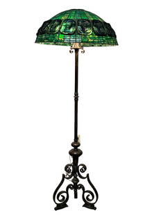 Tiffany Studios Bronze Floor Lamp with Turtle Back Green Leaded Glass Shade: Impressed stamps on bottom of feet Tiffany Studios New York bronze floor lamp with four sockets. Standing approx 68" tall with great patina throughout as shown. Only the base is marked, yet fitted wit