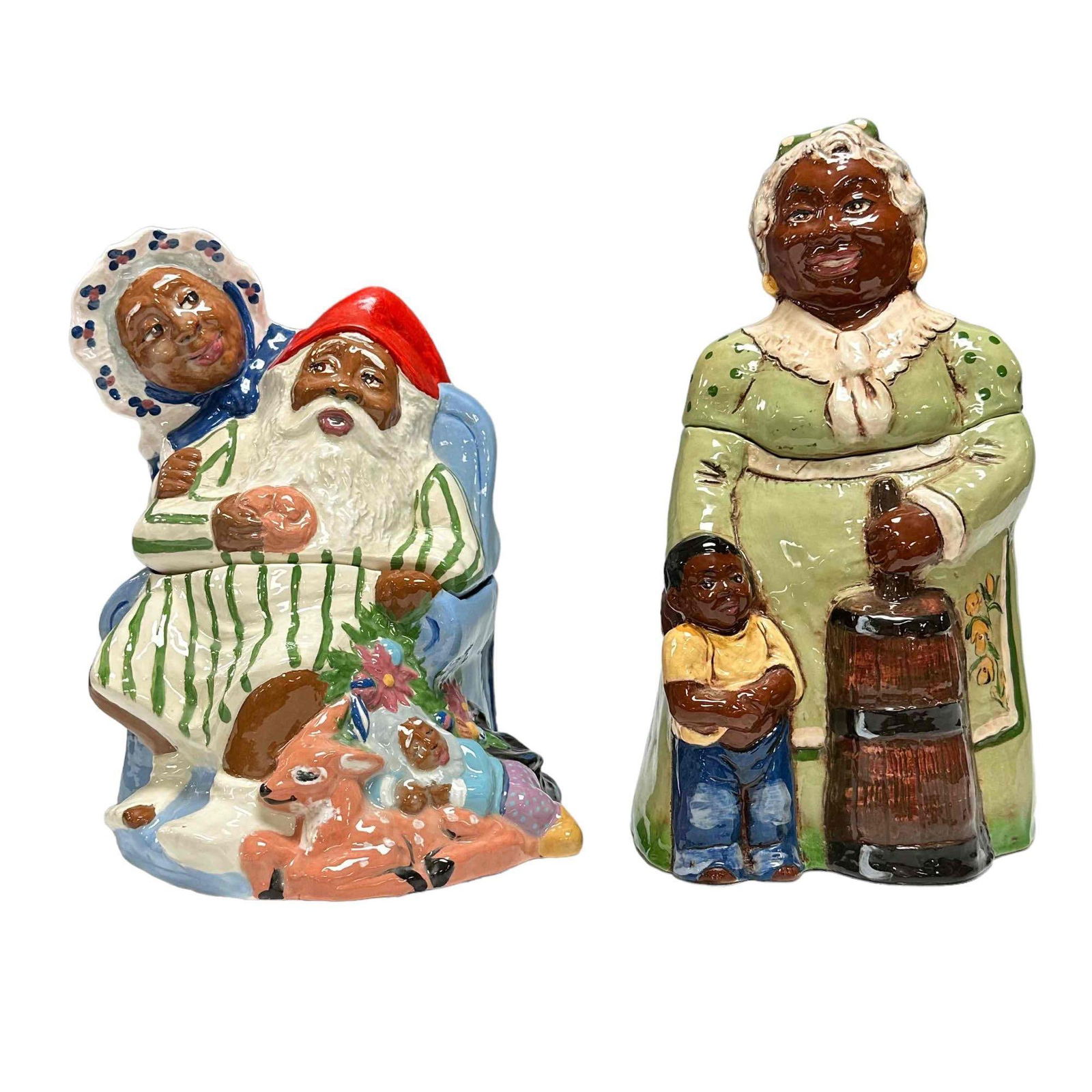 Two Rick Wisecarver Black Americana Cookie Jars for Roseville: Includes Rick Wisecarver Santa & Mrs. Claus Cookie Jar measuring approx 11.3/4" tall signed on side as shown in good condition and a Rick Wisecarver (1950-2002, American) Wihoa's Original Black Ma