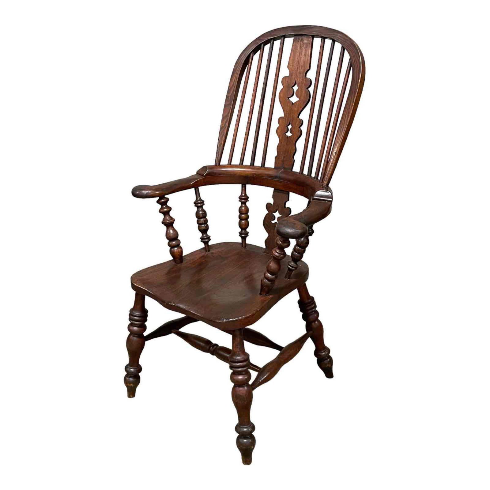 American Country Oak Windsor Arm Chair: Measuring approx 45" high x 26" wide x 19.5" deep x 17" seat height. Overall condition is good. Normal use and wear. See photos.