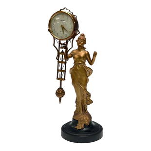 Art Nouveau Style Lady Swing Clock by Linden: 1940-50 Japan, Elegant woman figural swing clock by Linden in working condition standing approx 14" tall. Left index finger loss as shown, otherwise very good condition, see photos.