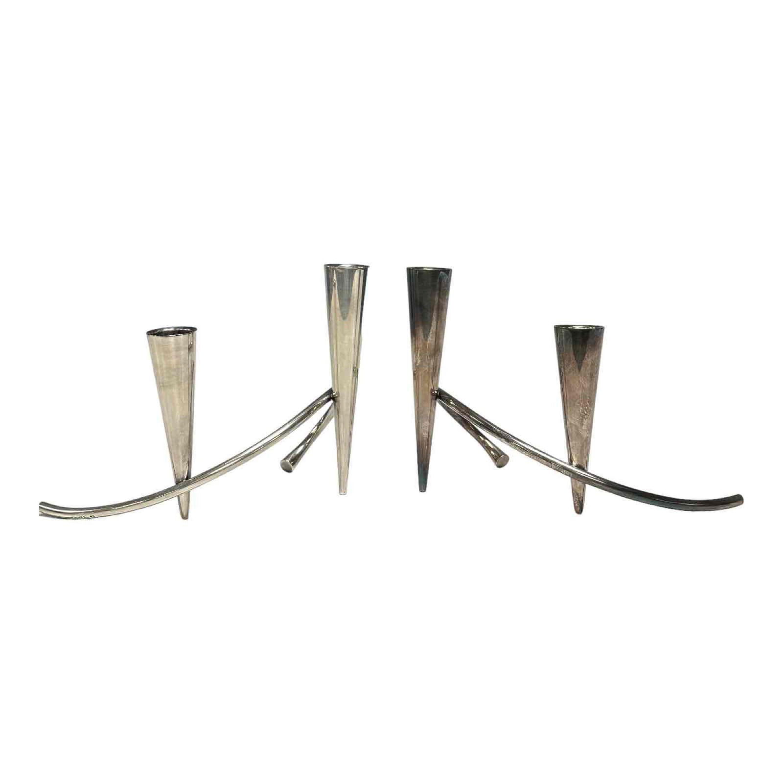 Mid Century Danish Modern Sterling Candle Sticks: Pair of Aage Weimar Danish 1902-1986) Sterling Silver Candelabras. Modernism designed stamped DENMARK Sterling having two trumpet candle stick supports by arched rod base. Measuring approx 5" tall x 8