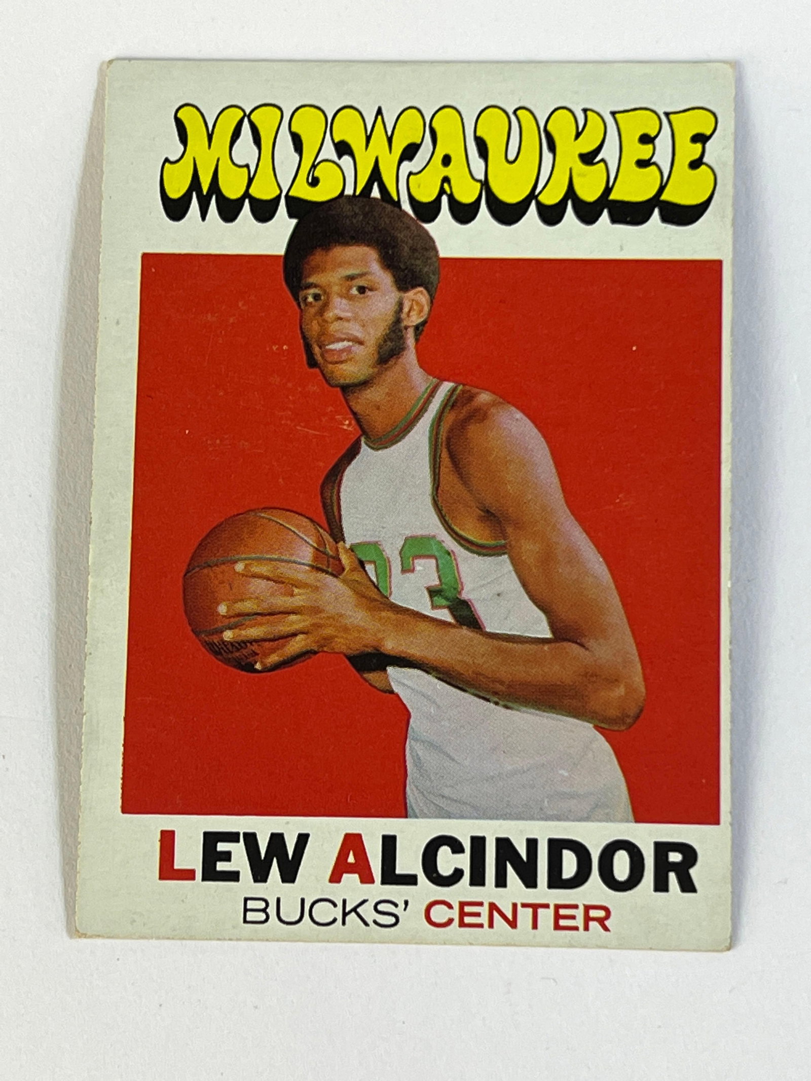 1971-72 Topps Basketball #100 Lew Alcindor: EX card of the HOF'er. Centering holds it back. The last year using this name on cards. Kareem Abdul-Jabbaræwas born!