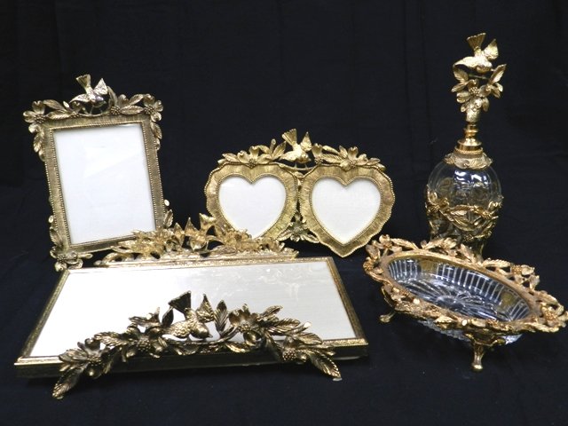 Matson Dresser/Vanity Items: Included in this lot is 5 pieces: 2 picture frames, perfume bottle,candy dish & . All pieces are decorted in gold with birds and leaves on them and marked Matson