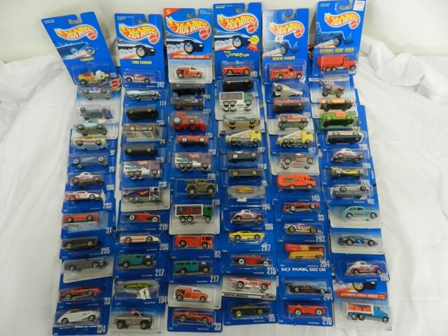 75 Blue Cards Hot Wheels: Includes first editions, series cars and more. CA 1990's-2000's, cars in mint condition on cards and cards in excellent condition.