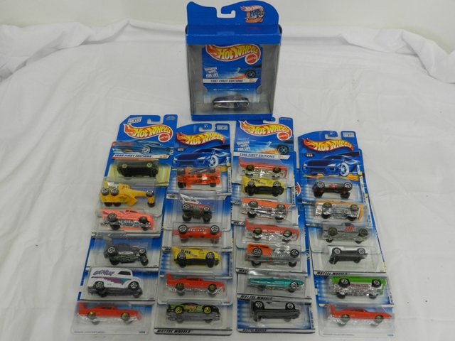 26 First Editions Hot Wheels: CA. 1990's-2000's, cars mint condition and cards in good condition.