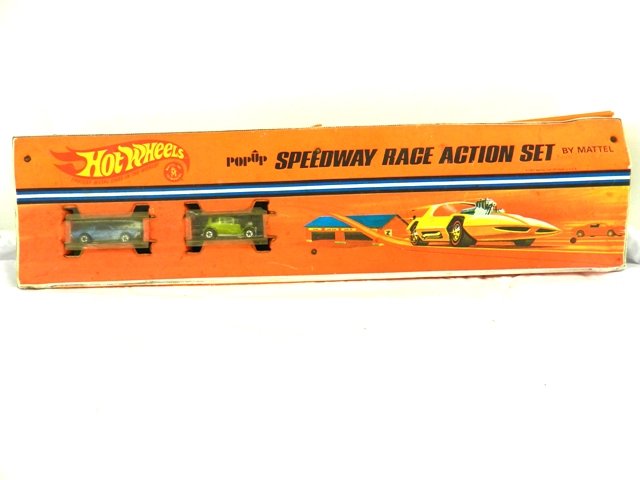 Popup Speedway Race Action Set: Hot Wheels popup speedway race action set. Has a foldout racetrack and comes with 2 commemorative red lines. CA. 1967, set in good condition.