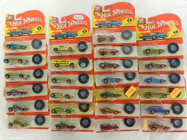 25 Authentic Commemorative Replica Red Line: Hot Wheels 25th anniversary collector edition. Cars in mint condition in package, CA.1992.