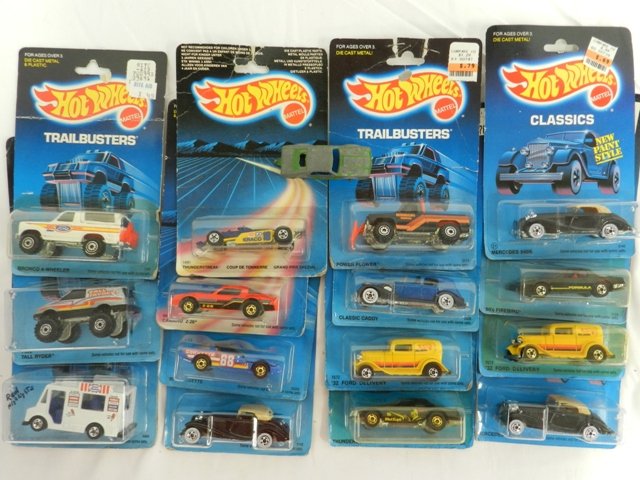 15 Hot Wheel Classics: Hot wheels classics include speed fleets, trailbusters, and workhorses. Cars in mint condition in package, CA. 1985.
