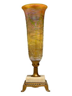 Attributed to Durand Pulled Feather Art Glass Torchiere Lamp: A fine, early 20th century irredicent art glass hurricane torchiere boudoir table lamp with string overlay (some losses) and pulled feather pattern. Attributed to DURAND art glass. Measuring approx 13