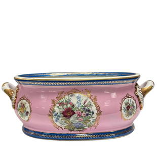 Large French LIMOGES Porcelain Cache Pot: Early 20th century, French Limoges floral decorated double handled ferner or jardiniere cache pot with mauve pink and blue main color with gold accent trim. Measuring approx 22" wide x 8.5" tall x 15"