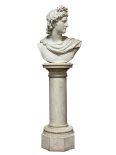 Fine Italian Carved Marble Bust of The Apollo Belvedere onPedestal: Stately, classical and massive 19th century Italian carved bust of The Apollo Belvedere on carved Carrara white marble cylindrical body base. Bust itsself measuring approx 25" tall x 21" wide and the