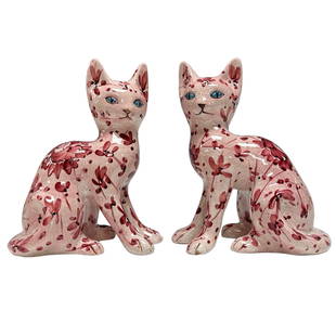 Pair of Porcelain Handpainted Floral Cats: Pink porcelain floral cat figurines with blue eyes by K.B.N.Y. Italy. Measuring approx. 7.75" tall. Having chips to front paws on both, see photos.