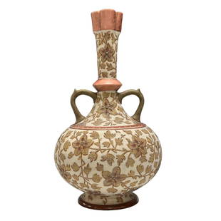 Early German Royal Rudolstadt Textured Vase: A f ine, detailed and highly attractive decorator late 19th century German long neck bottle vase in the Japanese Satsuma manner with textured decoration and double handles. Floral full body with mint