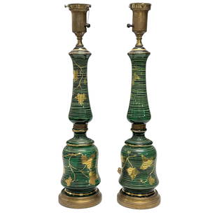 Pair of Bohemian Green Art Glass Lamps: Fine and highly decorative pair of Green art glass lamps with mint green enameled string overlay and gold leaf accents. Unmarked, possibly Moser. Measuring approx 24.5" tall. Design that caters to man