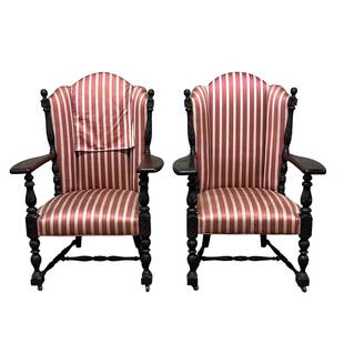 Pair of 1930's Era Carved Fireside Arm Chairs: Pair of carved fireside chairs. Measuring approx44" tall x 321" (arm to arm) x 27" deep. Original silk striped fabric (soiling, fade and tears) need recovered as shown.See photos