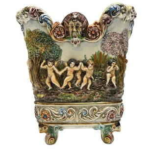 20th Century Capidomonte Majolica Footed Jardiniere: A fine 20th century Italian, capodimonte square body footed planter with Renaissance motif. Measuring approx 12" tall x 11" x 11". Light interior firing crack, otherwise good as shown, see photos