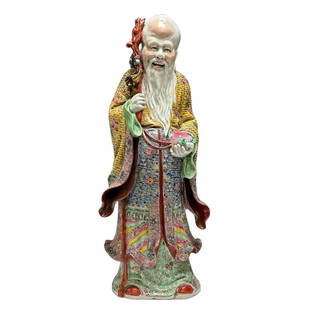 Shoulao God of Longevity Porcelain Figure 21.5": Chinese porcelain famille rose decorated figure of Shoulao God of Longevity porcelain figure holding peach and staff. Measuring approx. 21.5" tall. In good condition with no chips of breaks, some dirt