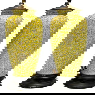 Chinese Export Famille Jaune Porcelain Vase Lamps: A fine enameled pair of Chinese export lamps on ebonized cylindrical bases. Early 19th century, later fitted into lamps as shown, see photos. Off white flowers with mint green ivy foliage over Famille