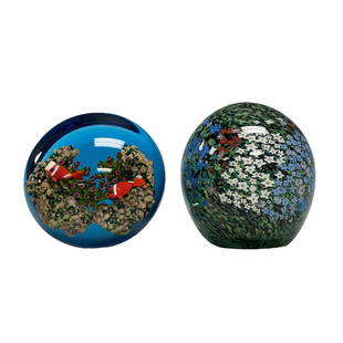 Hand Blown Aquatic Art Glass Paperweights: Very well done hand blown paperweights. One Oval shaped multi-colored swirling floral pattern, in clear glass. The second is just great. Aquatic coral reef pattern with 2 small clownfish, "Nemo".