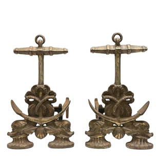 Fine Pair of Nautical Anchor and Dolphin Andirons: Great set of fireplace Cast Iron Dolphin and Anchor Andirons, circa 1920s. Showing signs of use and wear consistent with age, as shown, see photos. Measuring approx Height 16.5 in. Depth 13 in.