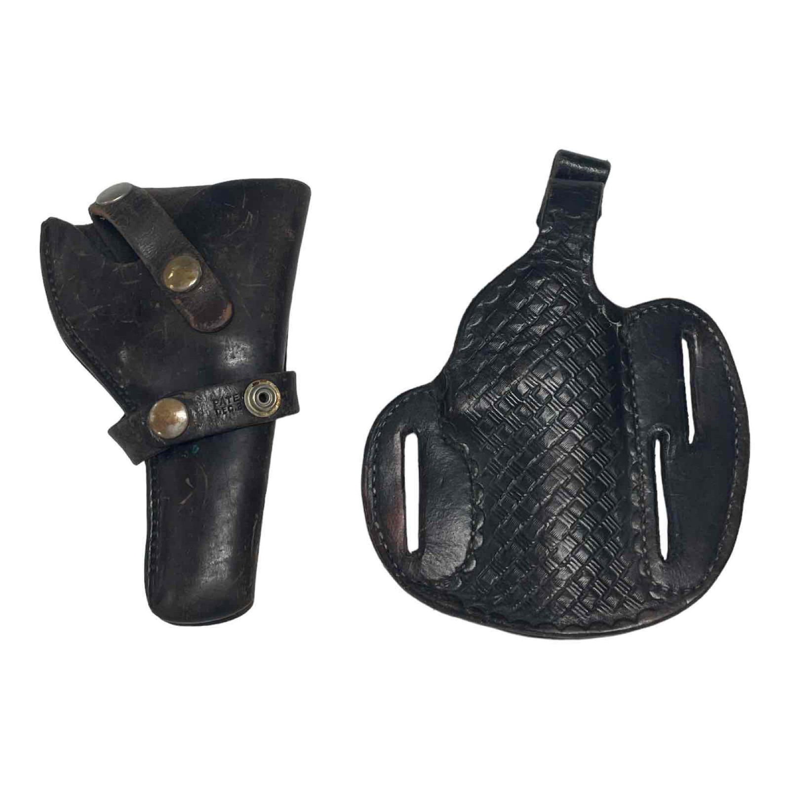 Two Early Revolver Leather Gun Holsters: Two early leather belt revolver gun holsters. Both in good vintage condition with signs of use, see photos.