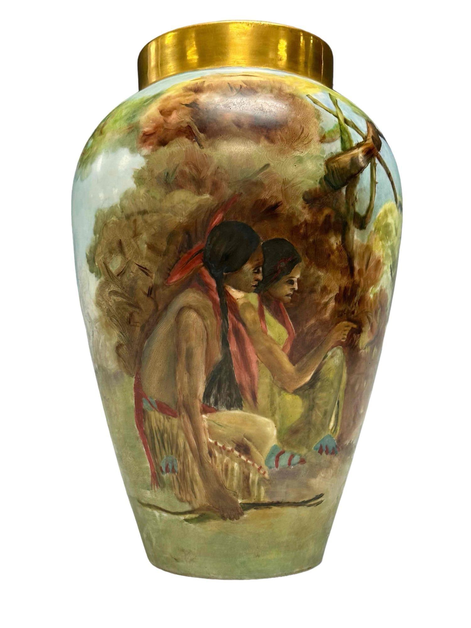 Native American Motif Limoges France Porcelain Vase: Bernardaud and Co marked B and C France hand painted vase with Native Indians with deer near country lake landscape, see photos. Measuring approx 14" tall. Light wear, see photos for details as shown,