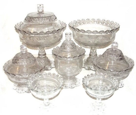 Globe & Star By Belmont 400 EAPG Seven Pieces: Ca. 1887, Including two large compotes one with covered lid, 12 1/2'' x 9'', one 8 1/2'' x 9'', two lidded jams jars 7 1/2'' x 6 1/2'', one lidded 8 1/2'' x 5'', two 4 1/2'' x 4 1/2 open tops, 4 with