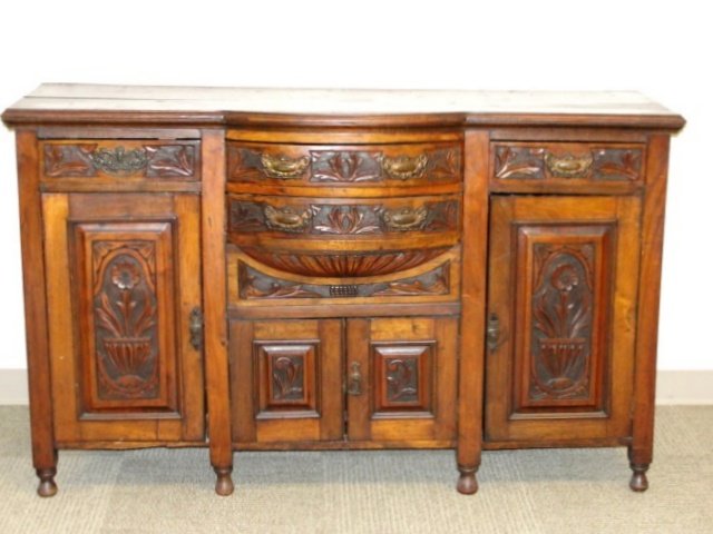 Carved English Sideboard Ca. 1900: With detailed carving on doors and drawers. Condition seam crack on top, missing one door pull, normal age scuff marks appropriate for age usage. H. 36'' W. 59'' D. 20''