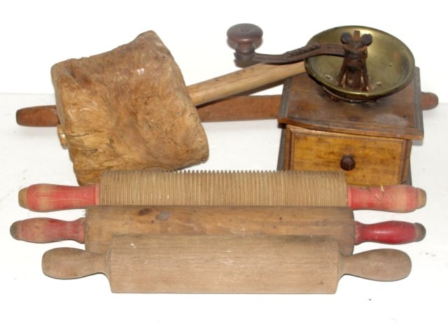 Collection Of Wood Kitchen Utensil's: Three rolling pins, Adams coffee grinder, and large smashing tool. Condition good coffee grinder need screws in top and chip of wood of corner.