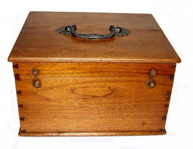 Oak Document Or Storage Box Ca. 1900: Condition good old original finish dovetailed box with ornate handle on top. Condition overall very good, tight split on top, at one point there was wood molding added to inside for shelf possibly ??.