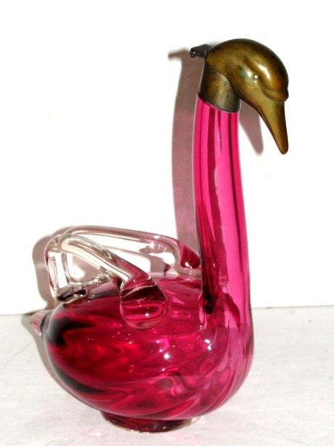 Austrian Cranberry Glass Swan/Bird Decanter: Austrian mold blown cranberry glass bird form decanter, polished bottom, hinged brass head form lid with glass eyes. No. 1541 on base. Condition glass very good, Swan head is pushed below neck, does n