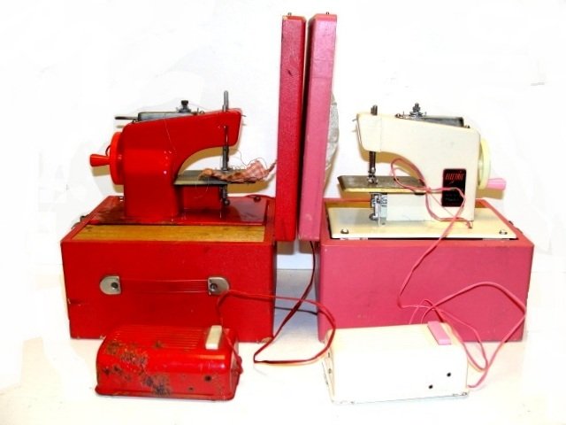 Childs Electric Battery Op. Sewing Machines: Both having cases. Frankonia Electric Machine in white with pink case, condition very good working order, like new. Kramer Little Modiste tin toy sewing machine made in Japan - battery operated. 7 1/2