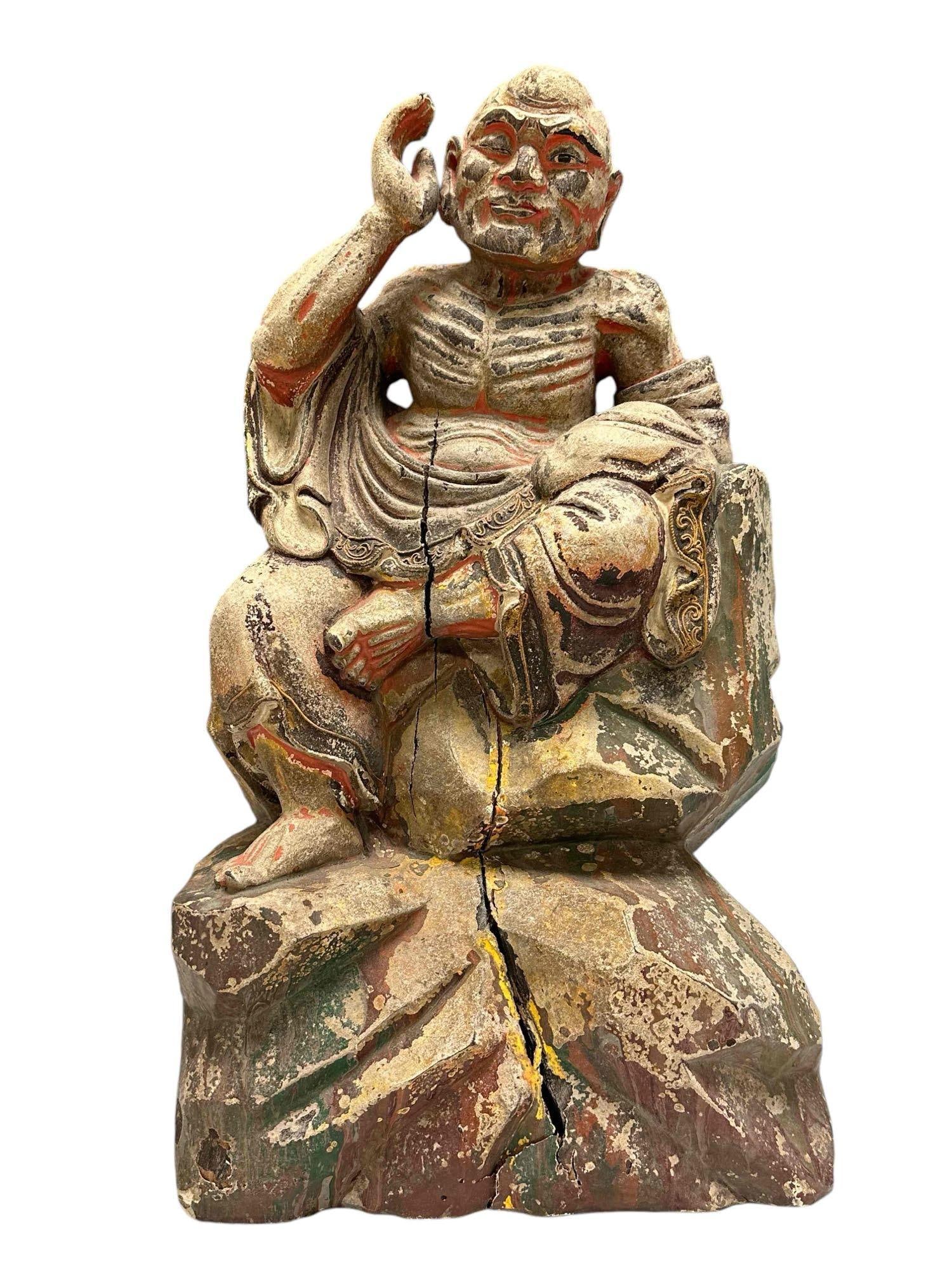 Chinese Bamboo Araken Carved Statue - Qing Dynasty: Qing dynasty, Chinese carved bamboo wooden sculpture with polychromed finish depicting sitting Chinese man. Losses to polychrome finish and separation as shown, see photos. Measuring approx 16" high x