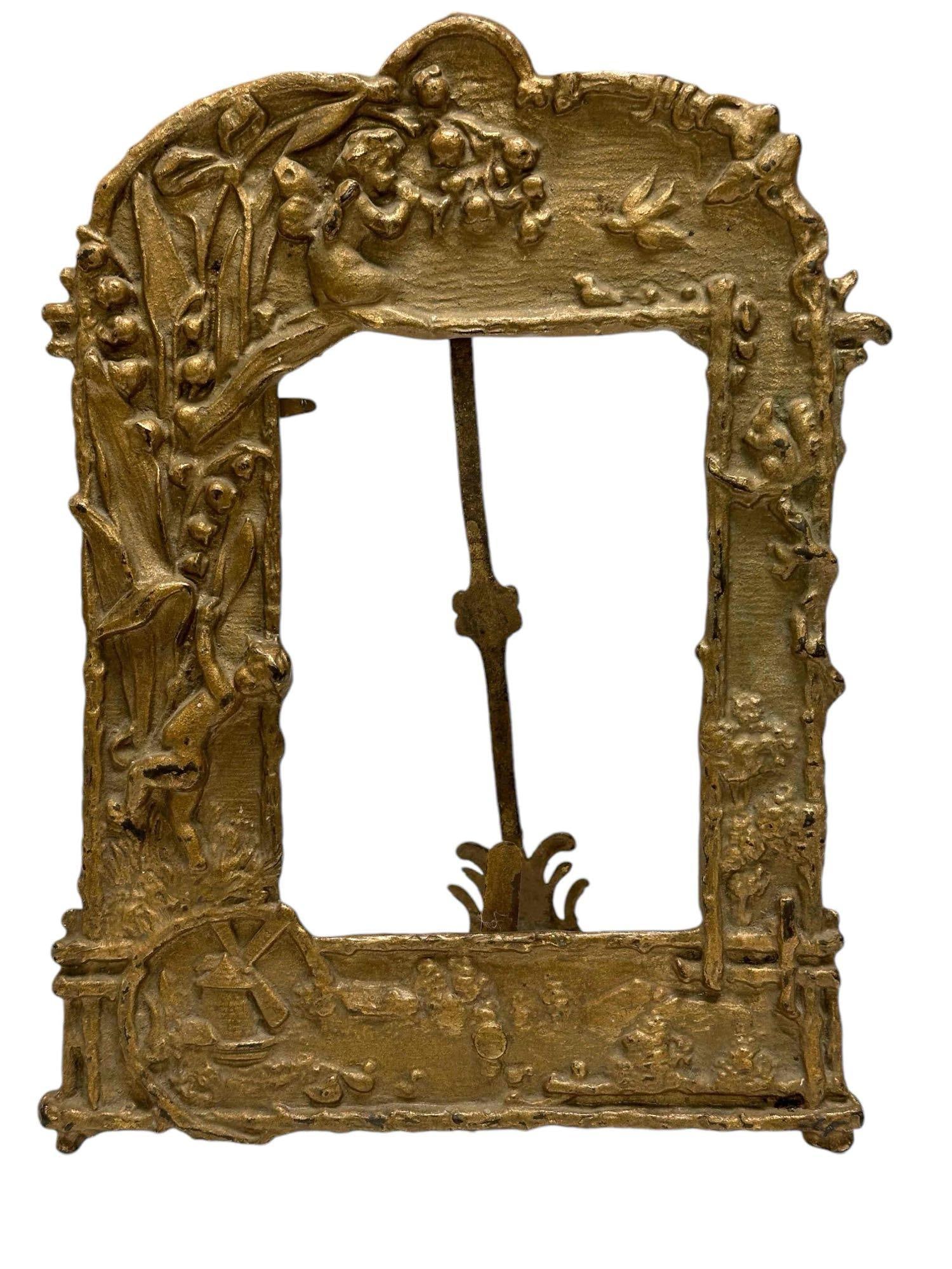 Bronze Frame with Neo Classical Fairy Cherub - NB & LW: Raied relief, self standing frame measuring approx 9.5" h x 7" w. Good conditon, see photo