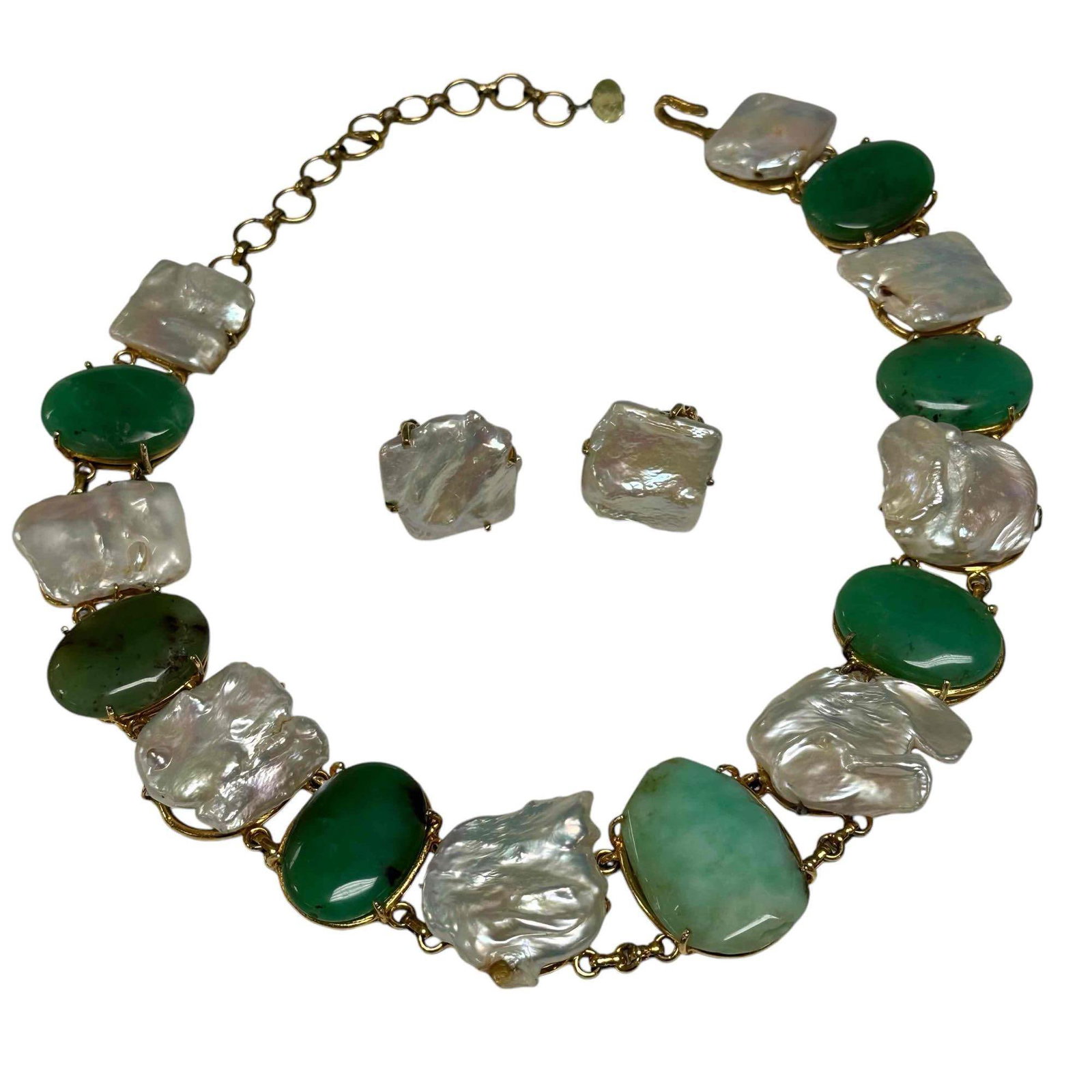Dyed Green Agate and Cultured Pearl Costume Necklace and Earring Suite: Dyed green agate and cultured pearl costume necklace and clip-on earring suite. The contrasting colors add a vibrant touch, making it a standout accessory for any occasion. Necklace allows for adjusta