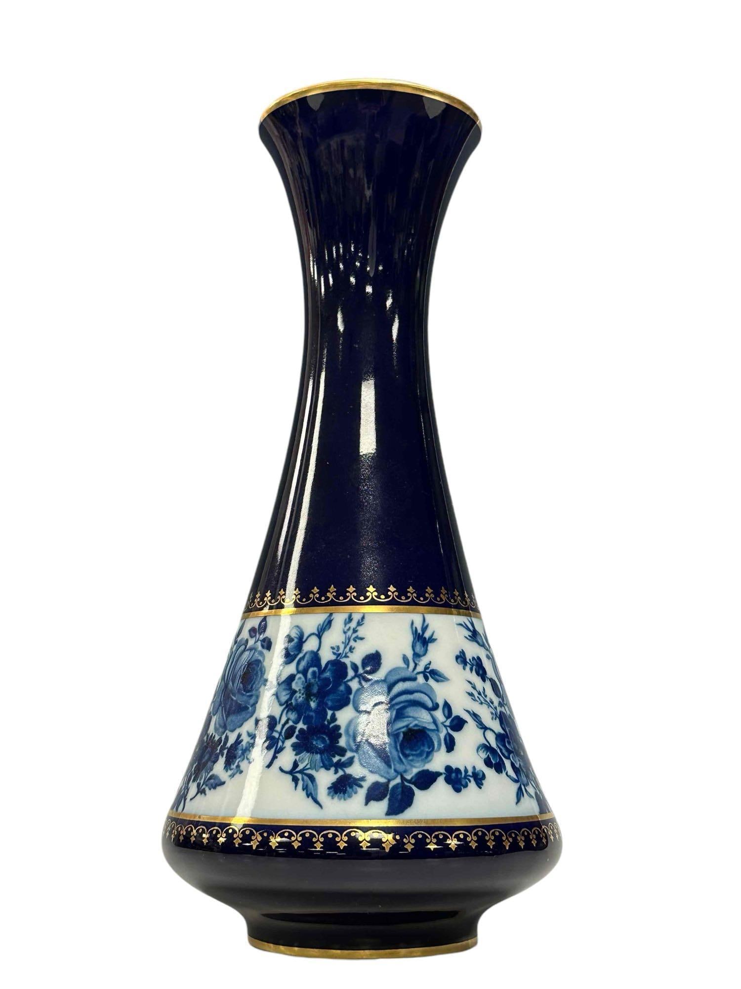 KPM German Cobalt Porcelain Vase: Flared top, gilt floral and cobalt lower body border. Bavaria KPM stamps on bottom as shown, highly attractive vase measuring approx 11.5" tall. Good condition, see photos