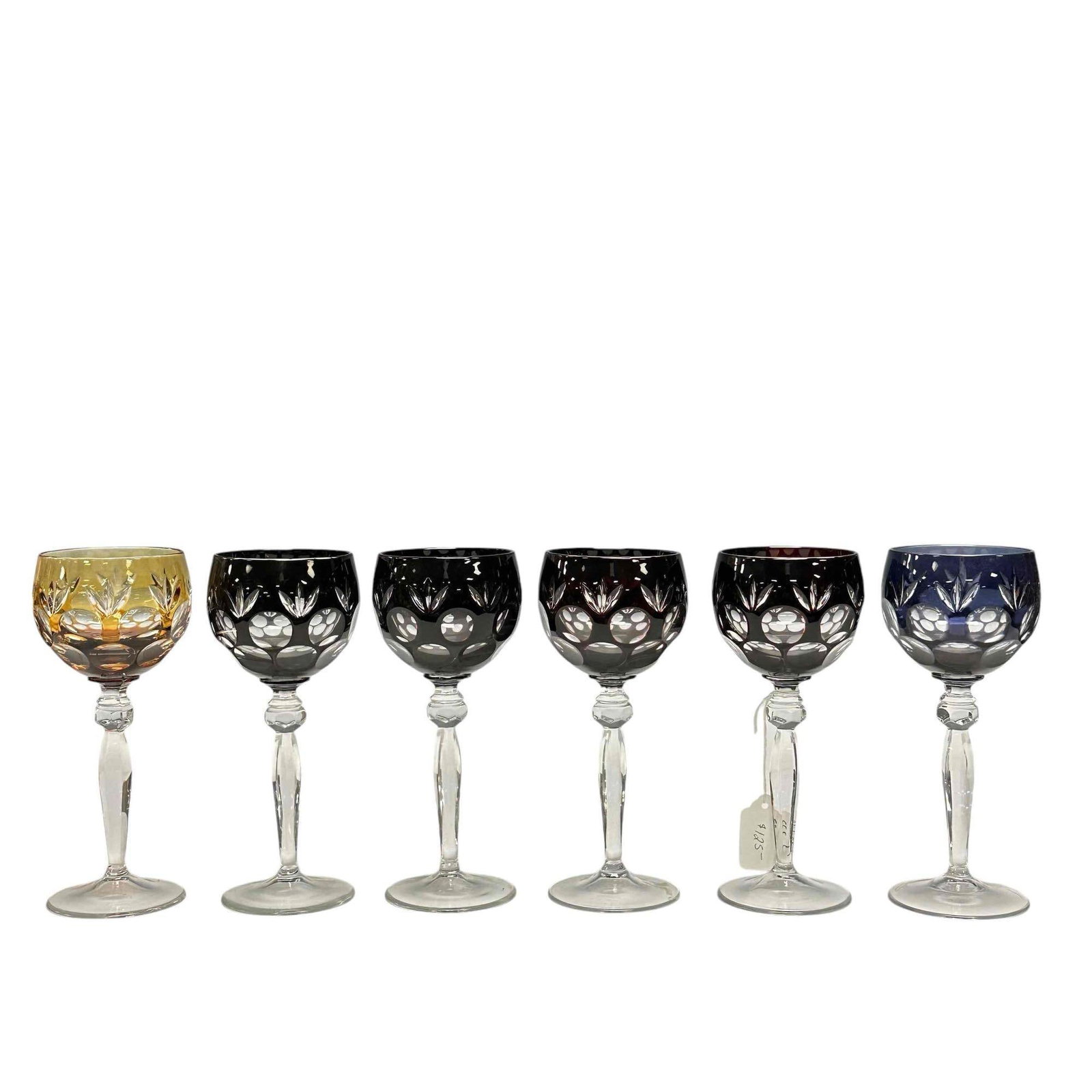 Set of Six (6) Cut to Clear on Colorless Pedestals Wine Stems: Including four pigeon blood / ruby, one amber / yellow and one purple. Wine stems standing approx 7 3/4" tall, good condition on all, no issues see photos