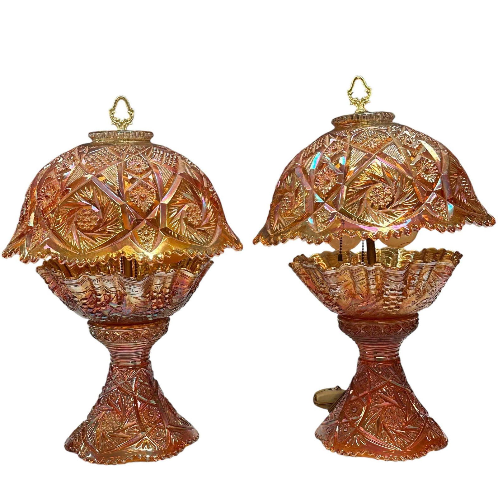 Pair of Unsual Marigold Carnival Glass Lamps: Well executed Carnival glass punch bowls and berry bowls, assembled into a pair of lamps. Measuring approx 22" tall x 14" diamete. very stylish conversion. See photos