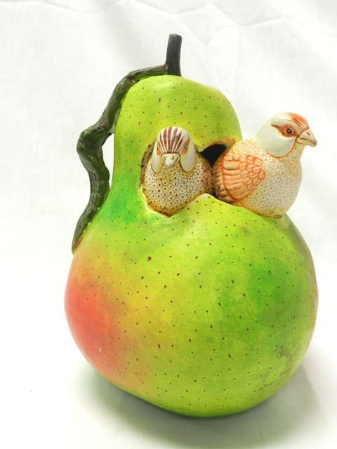 Sergio Bustamante Sculpture- Pear w/ Birds: Wonderful example of Mid Century designer Segio Bustamante with this Pear fruit with 2 young birds peeping through title is unknown. Approx 7" x 5" in size.. Condition is good. Signed along side as sh