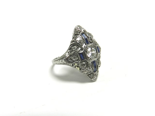 Art Deco Platinum, Diamonds & Sapphire Ring: Ladies Art Deco diamond ring with sapphires in a Edwardian platinum frame. Condition is very good