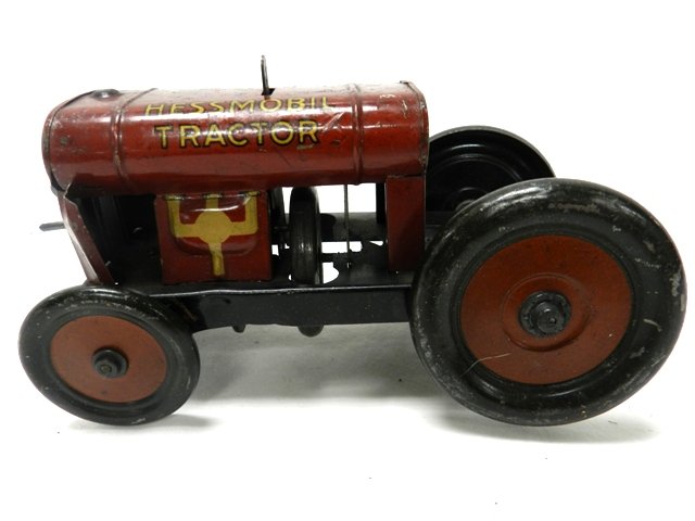 Hess Tin Wind-Up Hess Mobile Tractor: Circa 1920's All original and working. Missing Driver. Made in Germany. Excellent Condition All Toys Come from A Collector in Cleveland Area. Premier Auction Galleries also does in house shipping