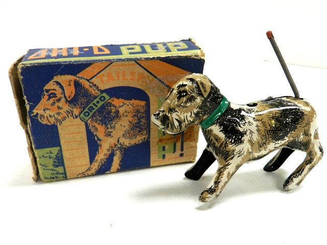 Orianna ORI-O Wind-Up Dog: Circa 1940's Near Mint Condition. All Toys Come from A Collector in Cleveland Area. Premier Auction Galleries also does in house shipping