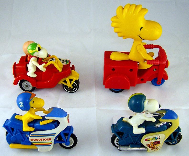 Lot of 4 Aviva Snoopy and Peanuts Toy Motorcycles.: Circa 1970's. Made in Hong Kong. Good condition.